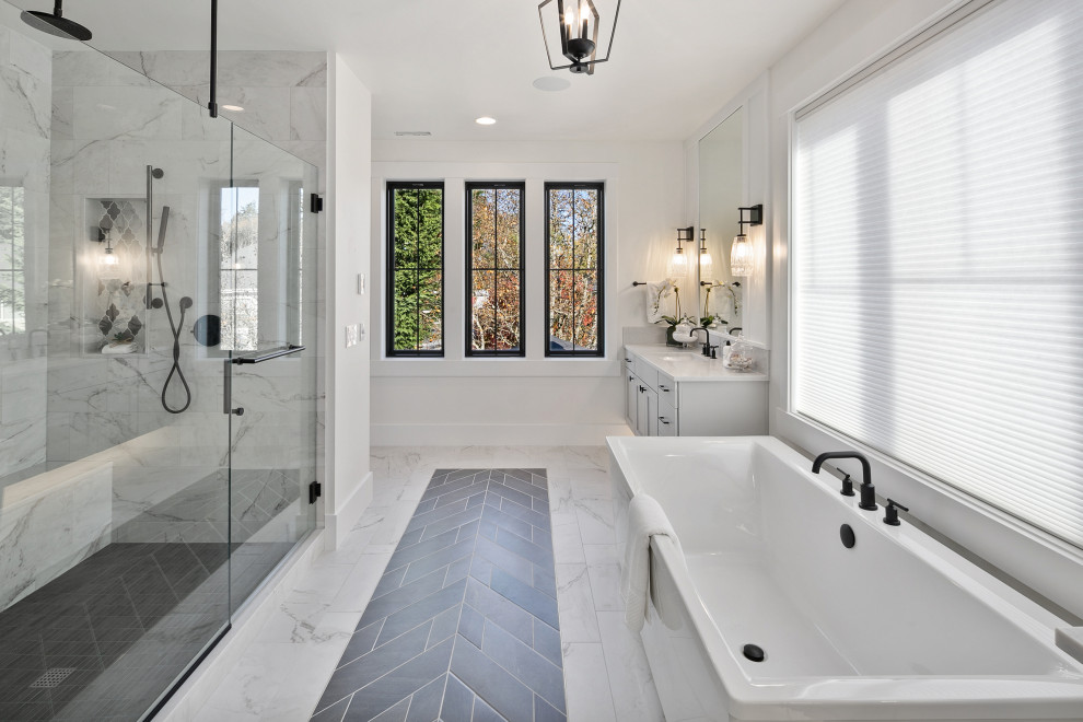 Example of a mid-sized cottage master white tile porcelain tile, multicolored floor and double-sink bathroom design in Seattle with recessed-panel cabinets, gray cabinets, white walls, an undermount sink, quartz countertops, a hinged shower door, white countertops and a floating vanity