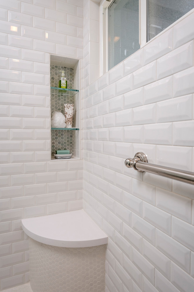 Inspiration for a mid-sized contemporary master bathroom in San Francisco with recessed-panel cabinets, white cabinets, an alcove shower, a one-piece toilet, white tile, ceramic tile, green walls, ceramic floors, a console sink, engineered quartz benchtops, white floor, a sliding shower screen and white benchtops.