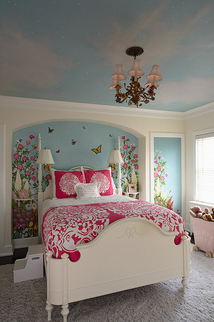 Girl's bedroom with artist painted walls, sky ceiling, and fiber optic