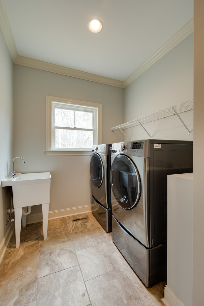 Design ideas for a traditional laundry room in Other.