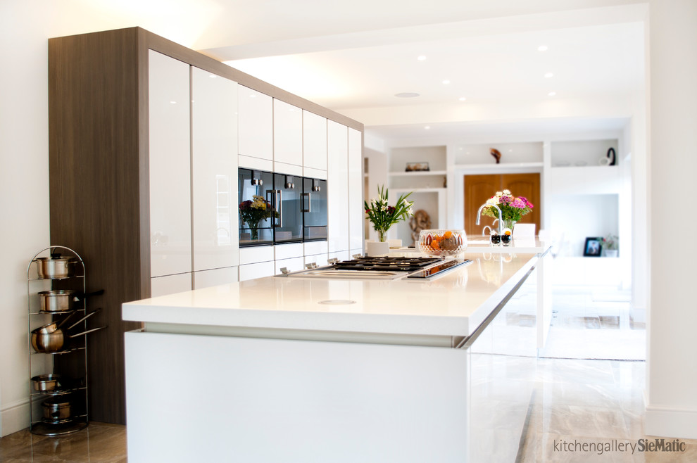 Design ideas for an expansive contemporary open plan kitchen in West Midlands with multiple islands.