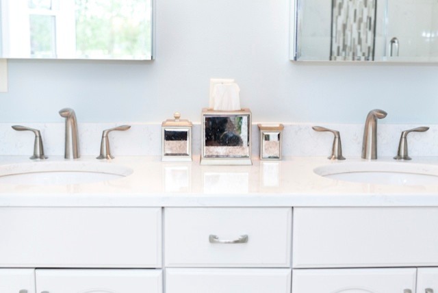 Mid-sized transitional master bathroom photo in Charlotte with an undermount sink, raised-panel cabinets, white cabinets, quartz countertops and blue walls