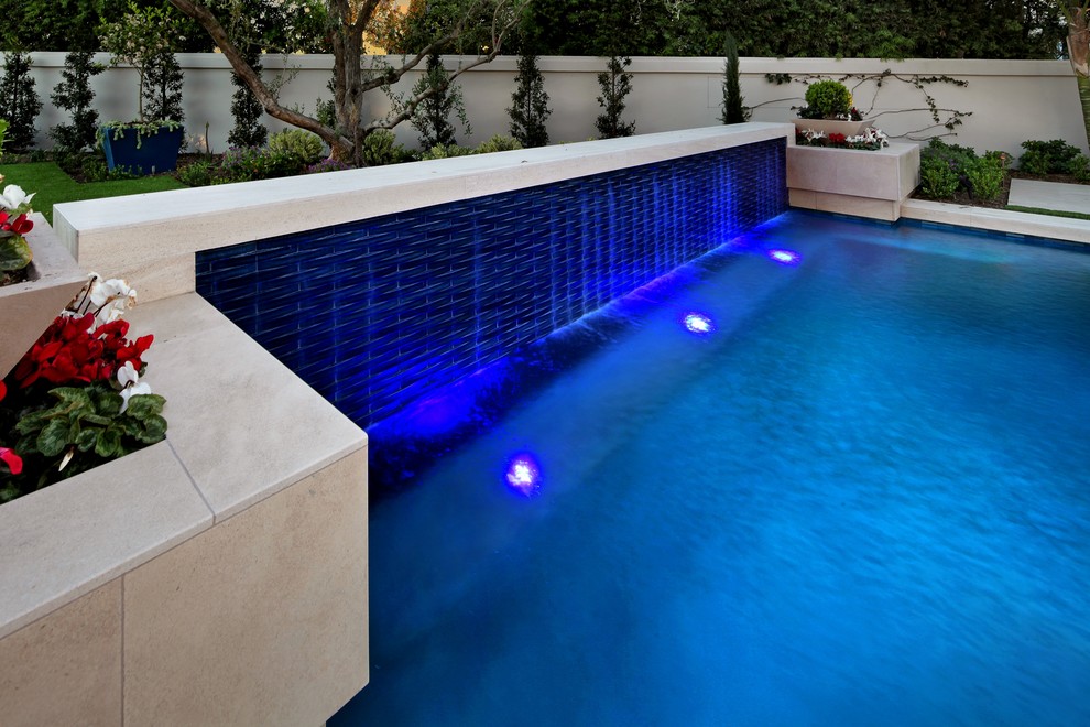 Inspiration for a transitional pool remodel in Orange County