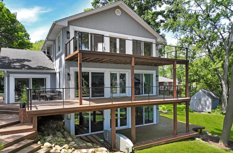 Inspiration for a cable railing deck remodel in Chicago