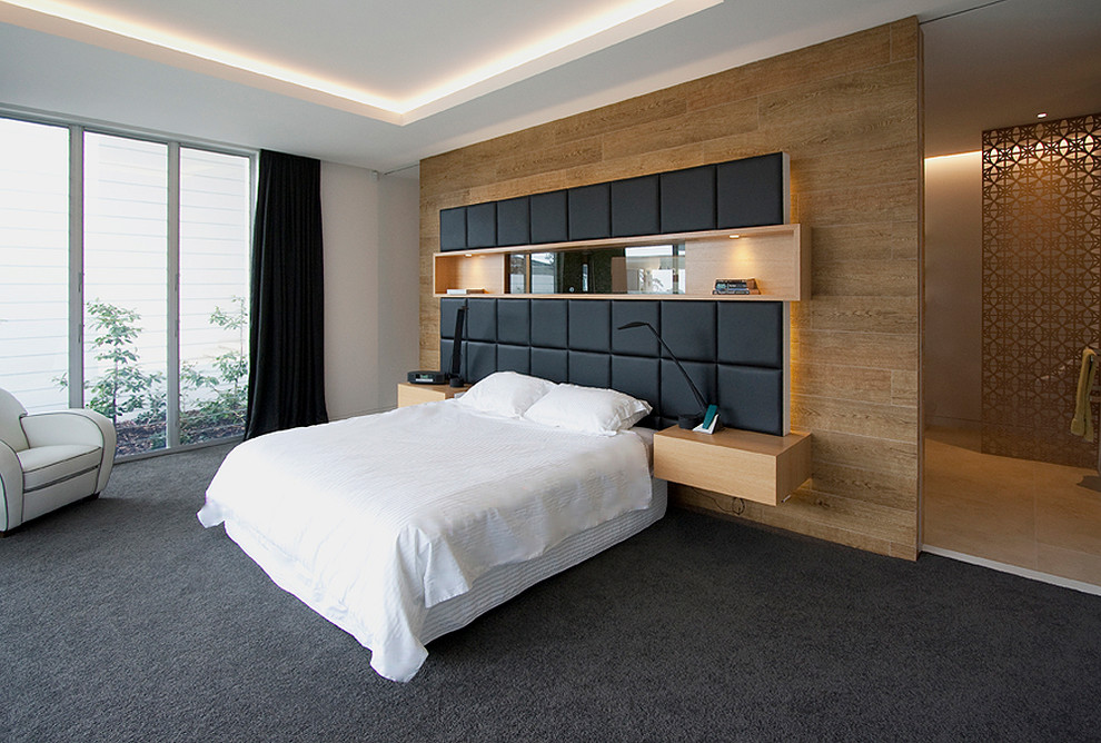 This is an example of a contemporary bedroom in Los Angeles.