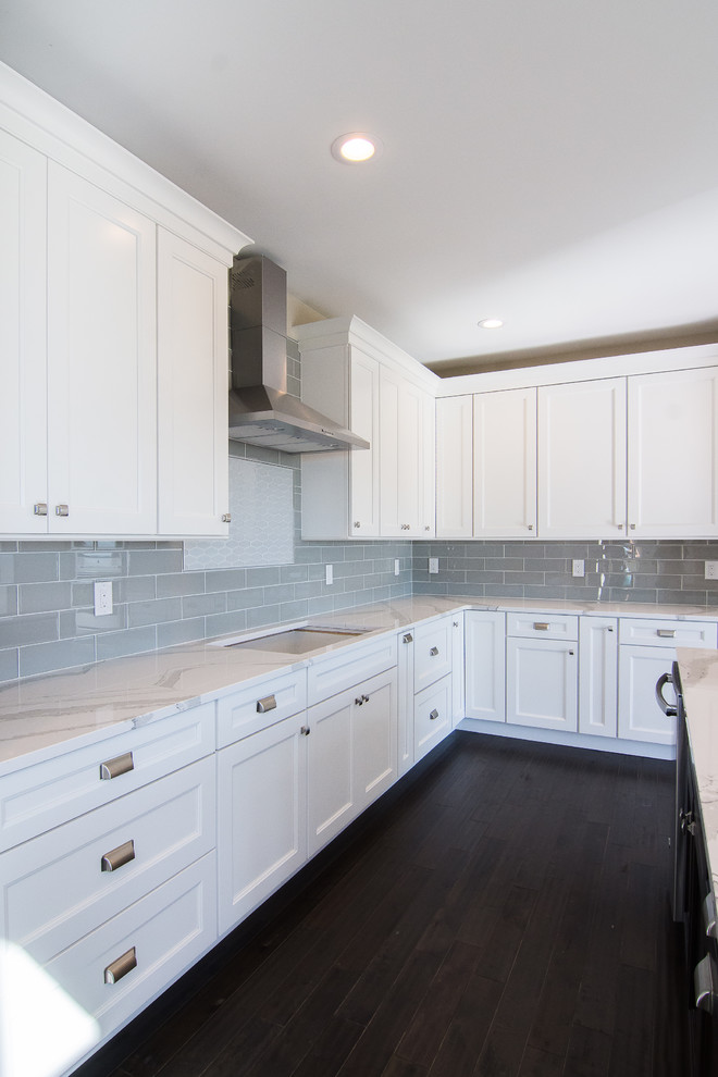 Example of a transitional kitchen design in Denver