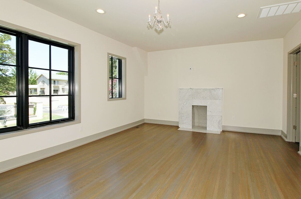 Transitional family room in Other with white walls and dark hardwood floors.
