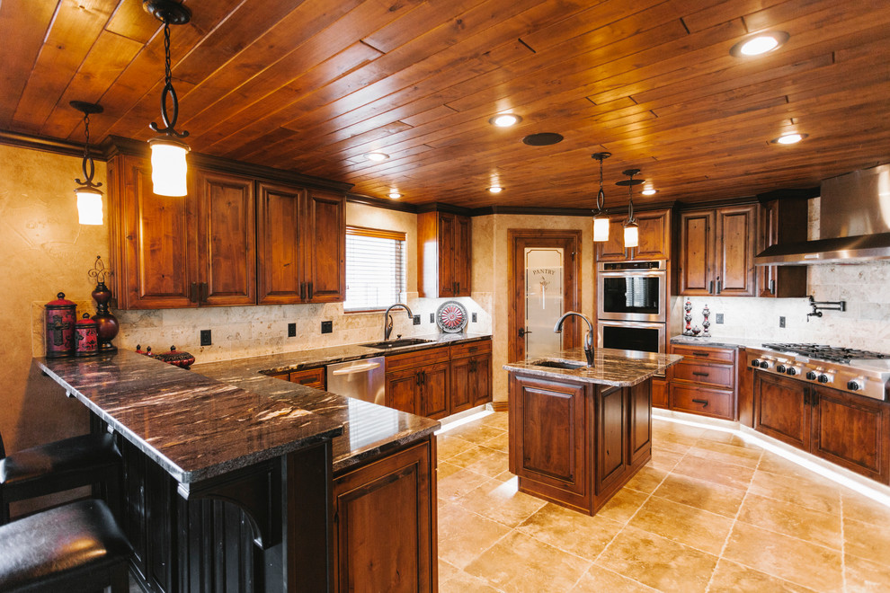 Kitchen - transitional kitchen idea with dark wood cabinets, quartz countertops, beige backsplash, custom tile backsplash, stainless steel appliances and beige walls