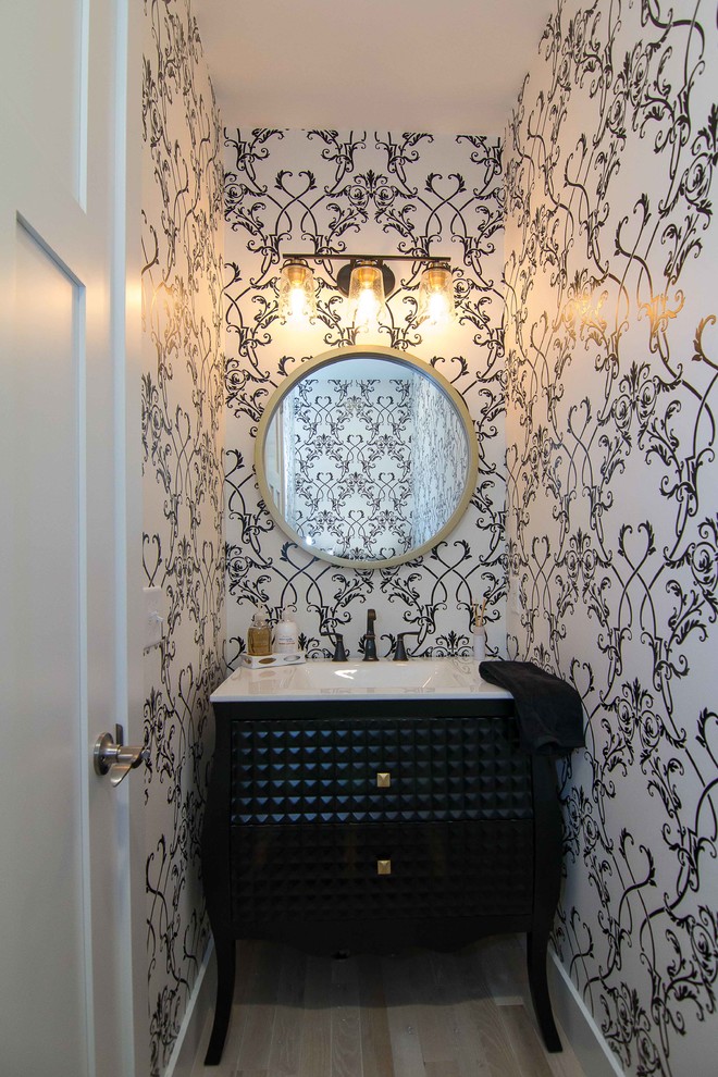 This is an example of a mediterranean powder room in Minneapolis.