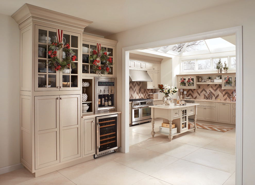 Photo of an expansive traditional l-shaped eat-in kitchen in Other with an undermount sink, recessed-panel cabinets, white cabinets, beige splashback, panelled appliances and with island.