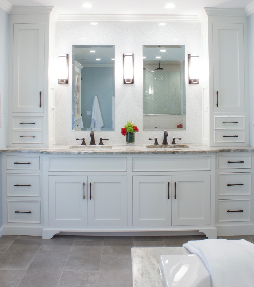 Large traditional master bathroom in New York with flat-panel cabinets, white cabinets, a drop-in tub, a curbless shower, a one-piece toilet, beige tile, ceramic tile, grey walls, porcelain floors, an undermount sink, quartzite benchtops, grey floor, a hinged shower door and multi-coloured benchtops.