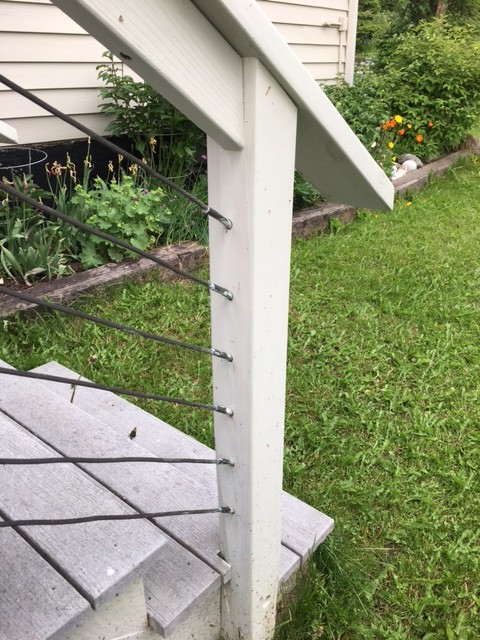 Example of a large arts and crafts backyard deck design