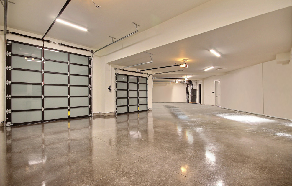 Inspiration for an expansive modern attached garage in Portland with four or more cars.