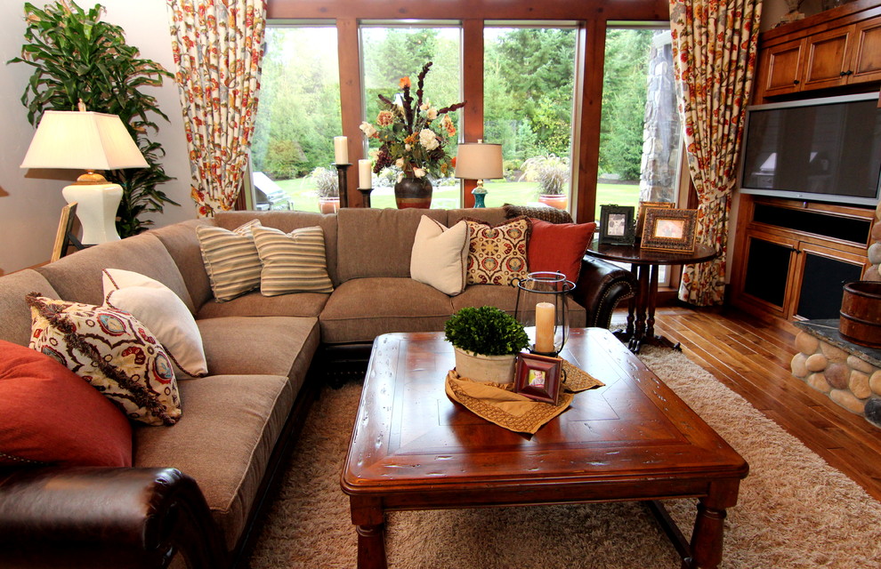 Large mountain style formal and open concept dark wood floor living room photo in Portland with white walls, a standard fireplace, a stone fireplace and a media wall