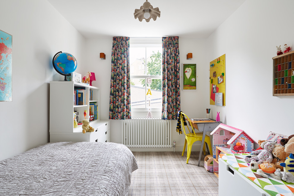 Design ideas for a mid-sized eclectic kids' bedroom for kids 4-10 years old and girls in London with white walls and carpet.