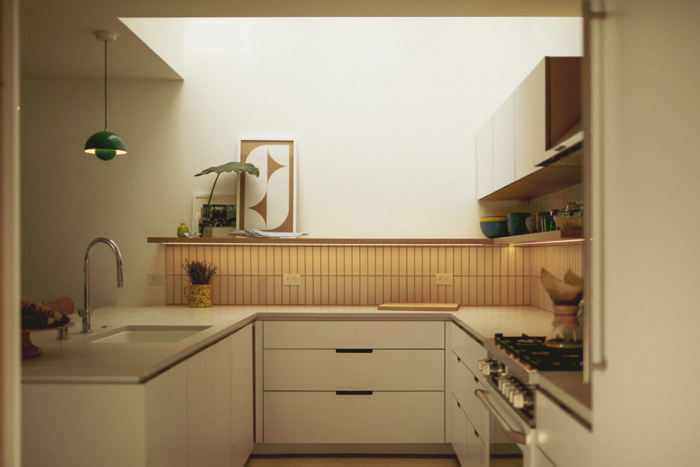 Scandinavian kitchen in San Francisco with white splashback and ceramic splashback.