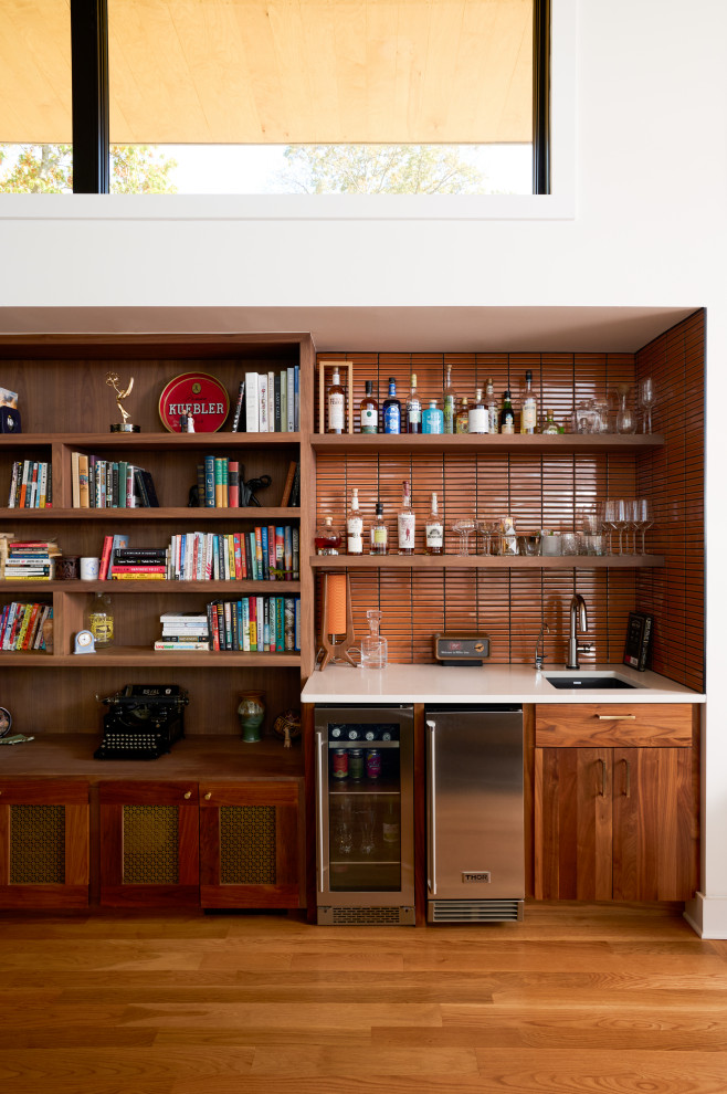 Inspiration for a mid-century modern home bar remodel in Other