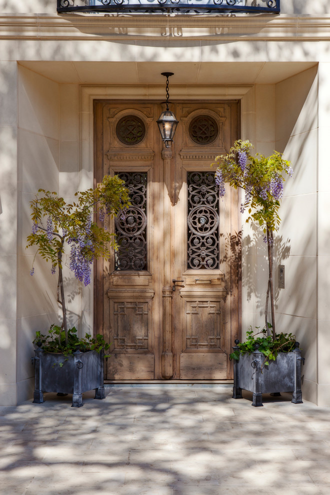 Inspiration for a mediterranean front door in San Francisco with a double front door and a medium wood front door.
