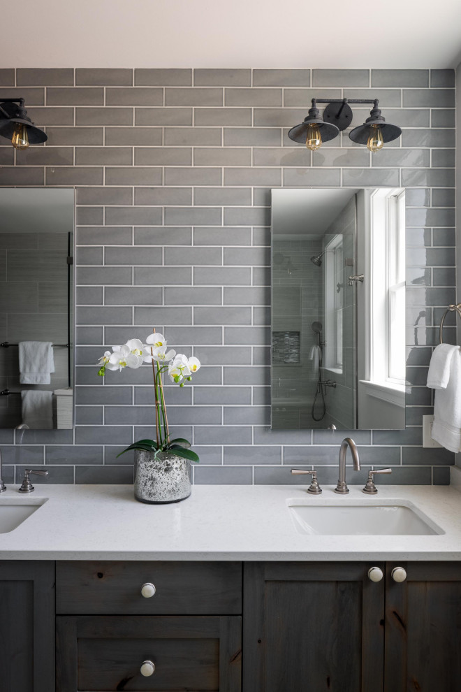 This is an example of a large transitional master bathroom in DC Metro with recessed-panel cabinets, distressed cabinets, gray tile, subway tile, grey walls, an undermount sink, engineered quartz benchtops, white benchtops, a double vanity and a built-in vanity.
