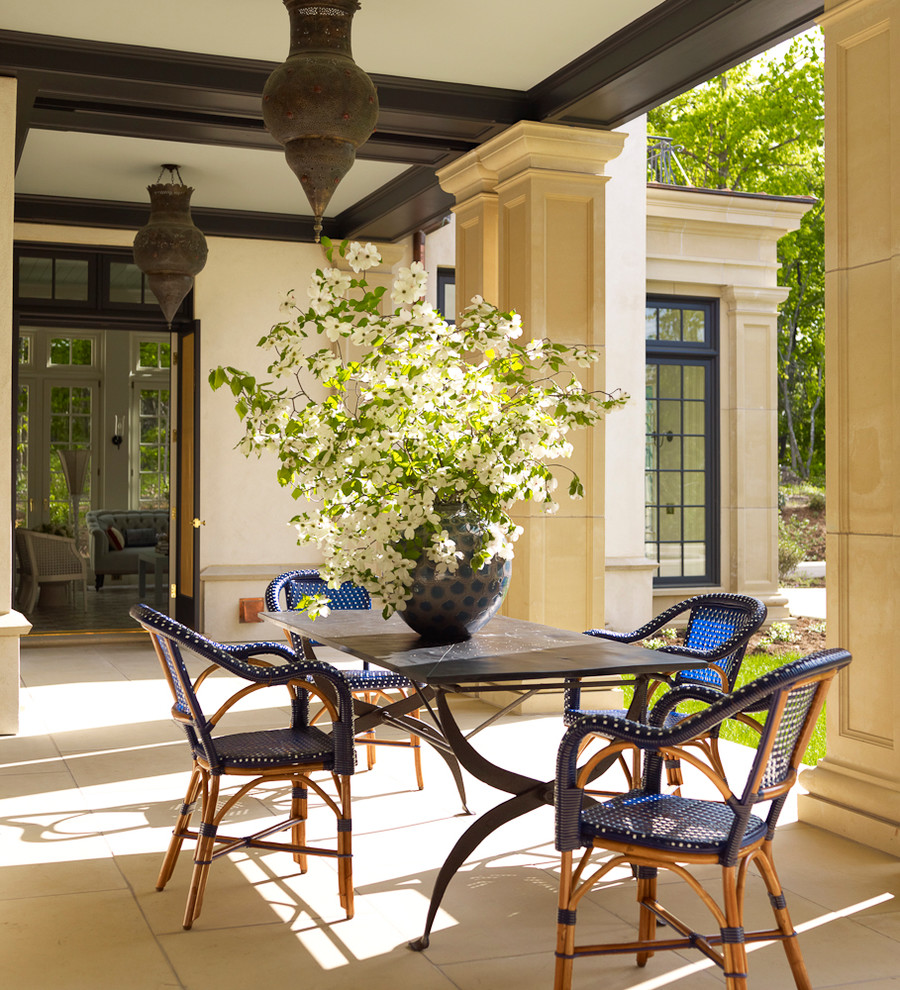 This is an example of a large transitional verandah in New York.