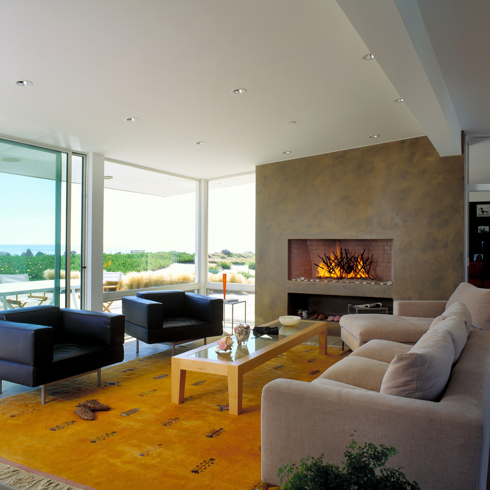This is an example of a large beach style living room in Santa Barbara.