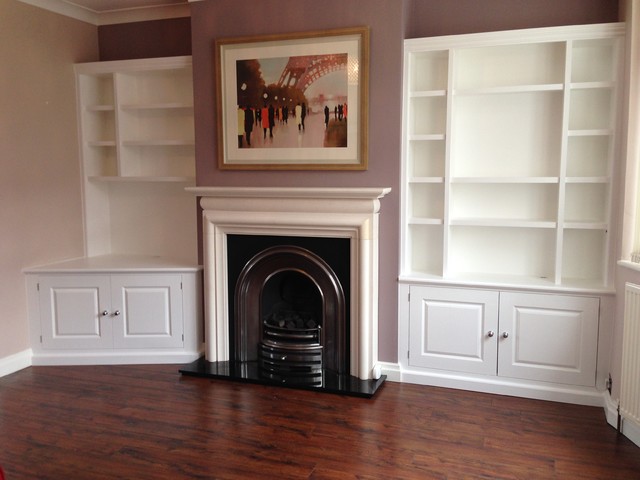 White painted  alcove  shelving units with lighting Modern 