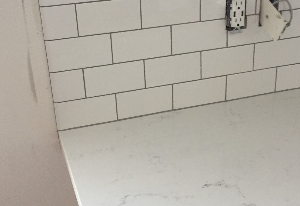Need advice! Which caulk color where counter meets wall/tiles?