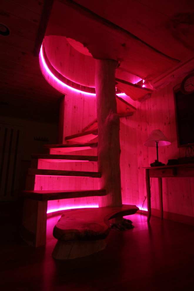 Example of a mid-sized mountain style wooden straight open and wood railing staircase design in Burlington