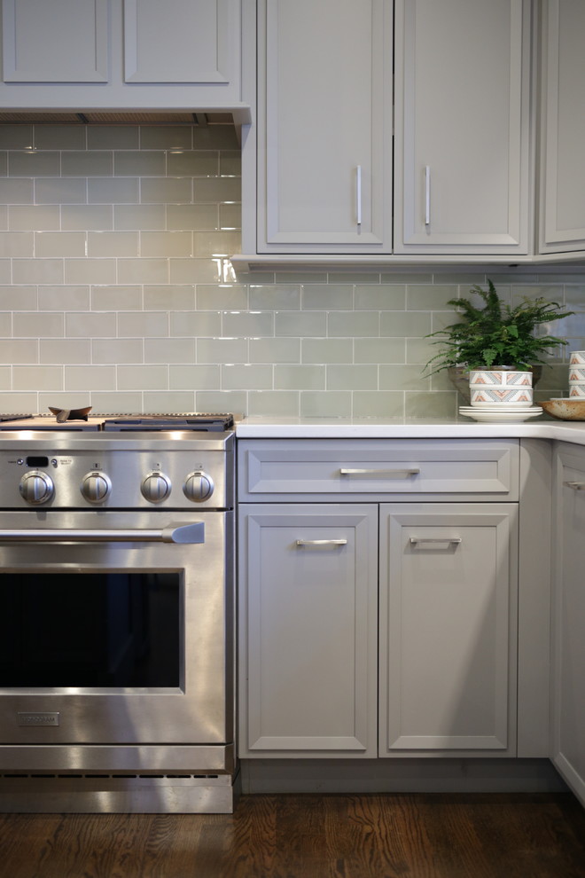 Eat-in kitchen - l-shaped eat-in kitchen idea with flat-panel cabinets, gray cabinets and an island