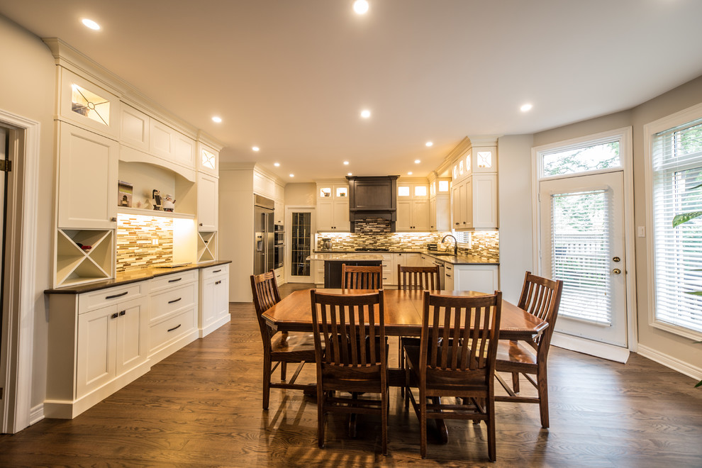 Example of a transitional kitchen design in Toronto