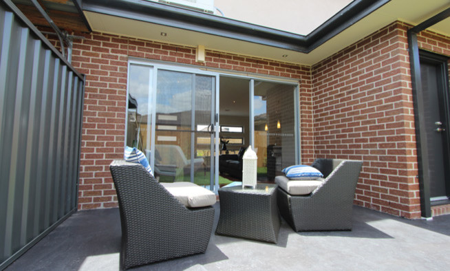 This is an example of a contemporary patio in Melbourne.