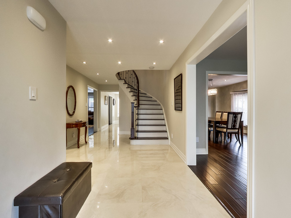 Entryway - transitional entryway idea in Toronto