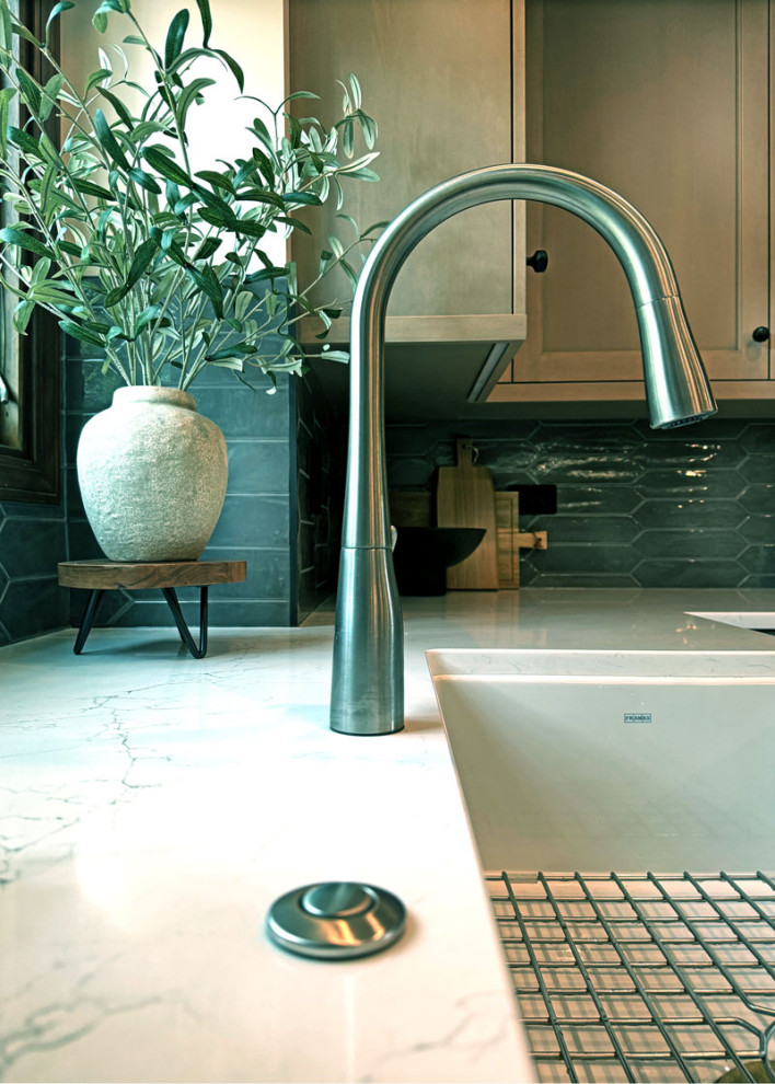 Example of a large transitional porcelain tile and gray floor eat-in kitchen design in Chicago with a farmhouse sink, recessed-panel cabinets, light wood cabinets, quartz countertops, gray backsplash, porcelain backsplash, an island and white countertops