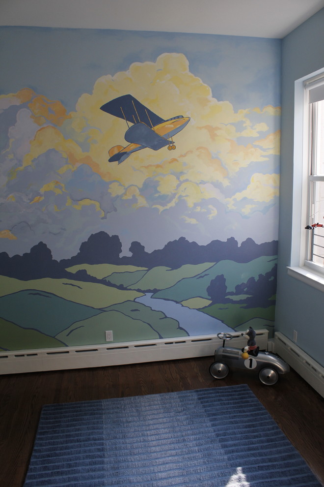 This is an example of a large midcentury nursery for boys in New York with multi-coloured walls and dark hardwood floors.