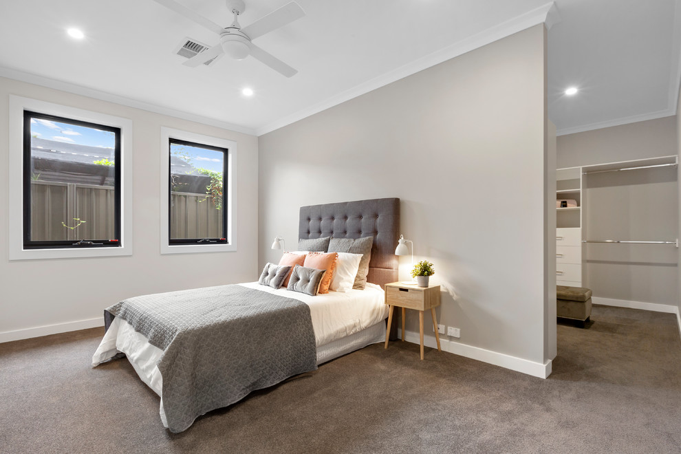 Inspiration for a large contemporary master bedroom in Adelaide with grey walls, carpet and grey floor.