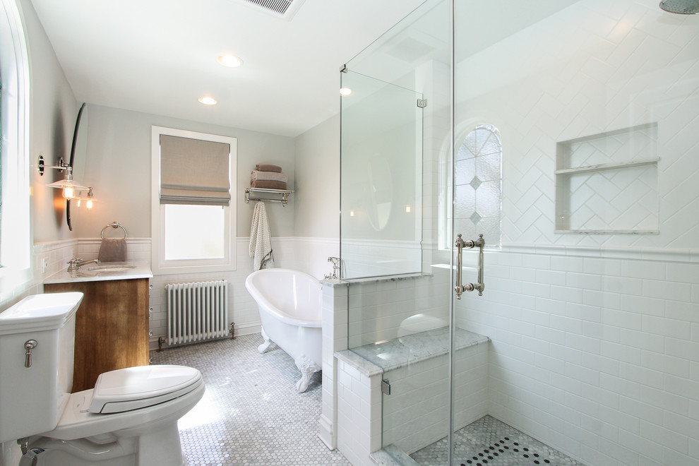 Design ideas for a mid-sized traditional master bathroom in Chicago with an undermount sink, flat-panel cabinets, medium wood cabinets, marble benchtops, a claw-foot tub, an open shower, a two-piece toilet, white tile, gray tile, multi-coloured tile, subway tile, green walls and mosaic tile floors.