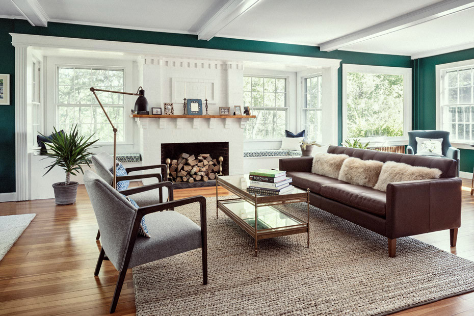 Inspiration for a contemporary enclosed medium tone wood floor and exposed beam living room remodel in Portland Maine with green walls, no fireplace and no tv