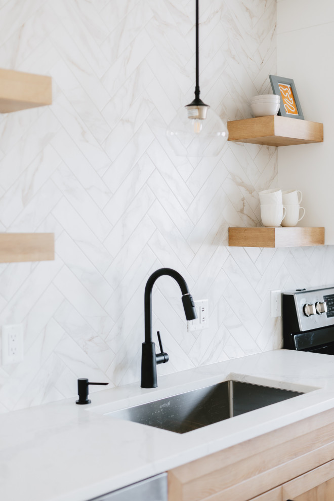 Example of a transitional kitchen design in Edmonton