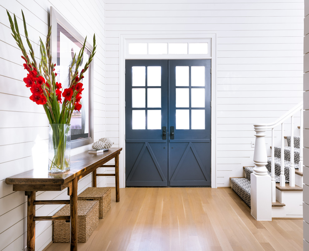 Transitional entryway photo in Dallas