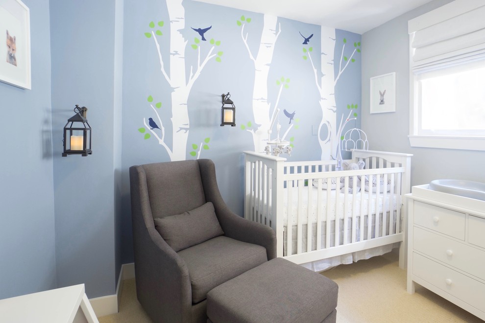 Small transitional gender-neutral nursery in San Francisco with blue walls, carpet and beige floor.