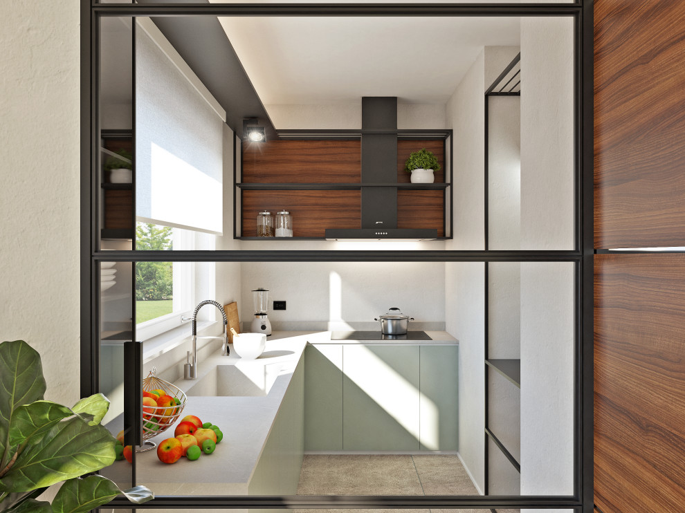 Small modern l-shaped separate kitchen in Milan with an integrated sink, flat-panel cabinets, green cabinets, quartz benchtops, grey splashback, window splashback, stainless steel appliances, porcelain floors, a peninsula, brown floor and grey benchtop.
