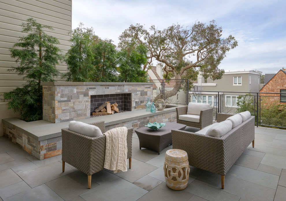 Inspiration for a transitional patio in San Francisco with no cover and with fireplace.