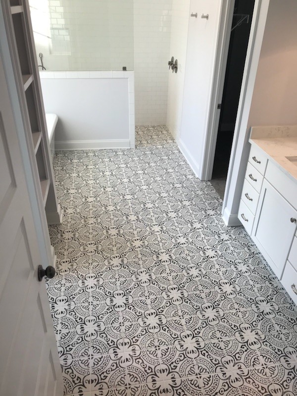 Example of a mid-sized minimalist porcelain tile and multicolored floor bathroom design in Other