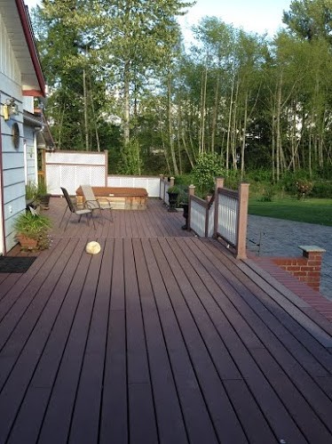 Deck - mid-sized transitional backyard deck idea in Seattle with no cover