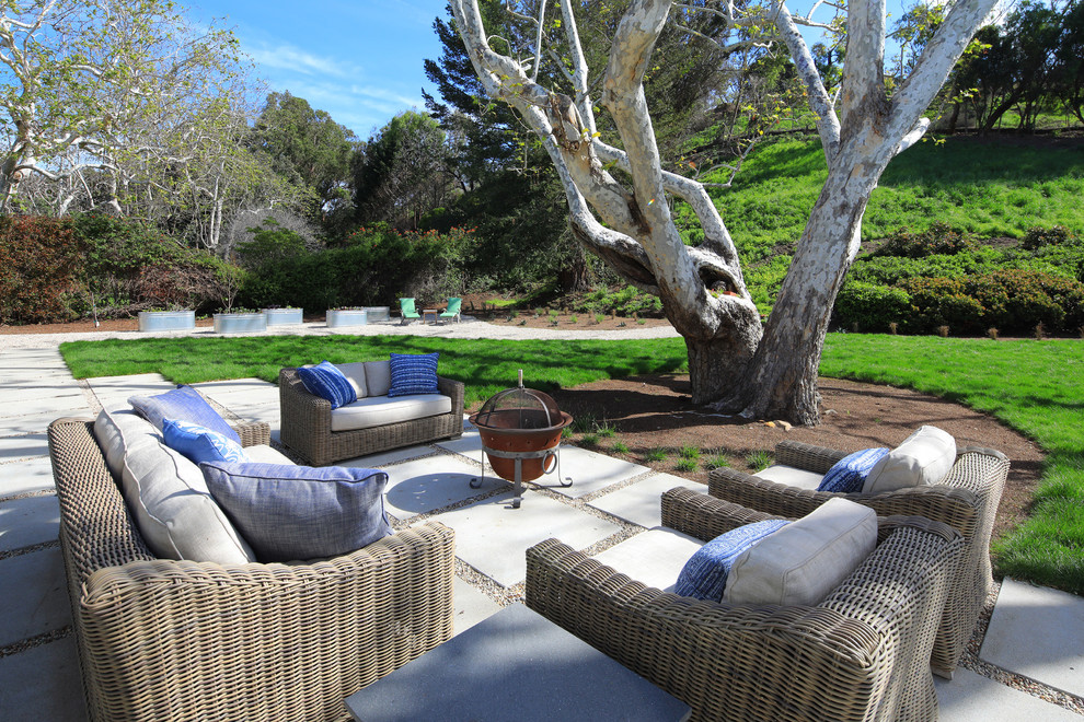 Inspiration for a country backyard patio in Los Angeles with concrete pavers and no cover.