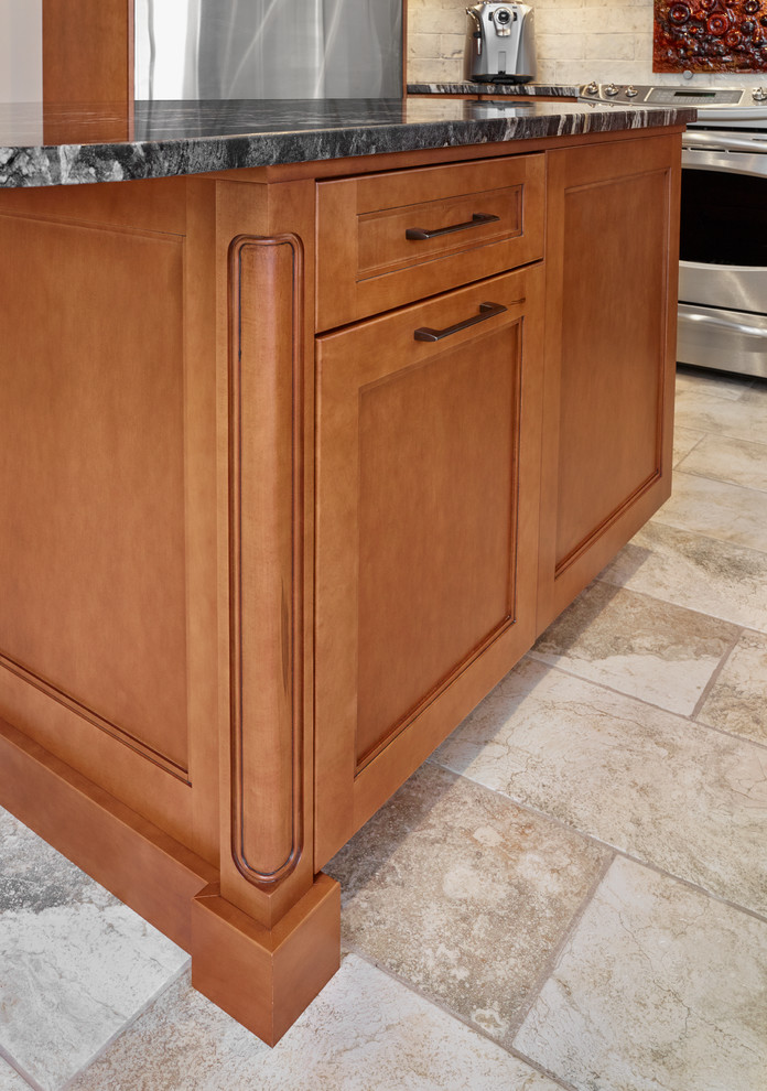 Example of a transitional kitchen design in Edmonton