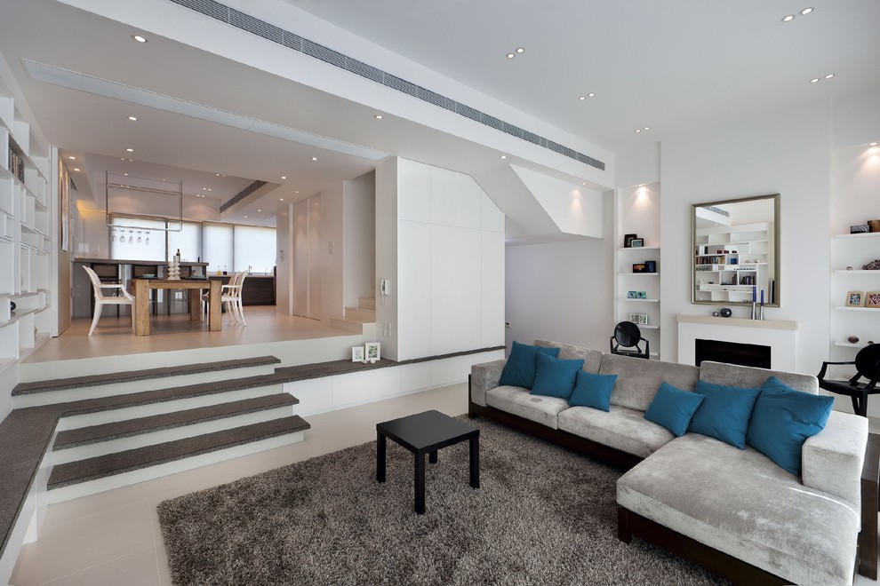 Inspiration for a contemporary living room in Hong Kong with white walls.