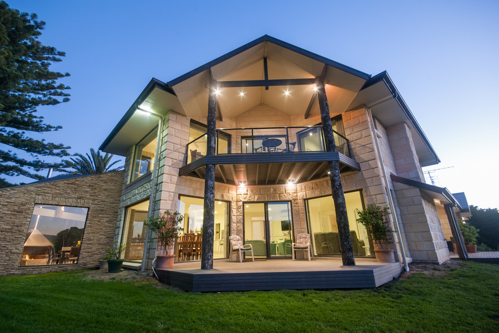 Photo of a mid-sized country backyard balcony balcony in Melbourne with a roof extension.