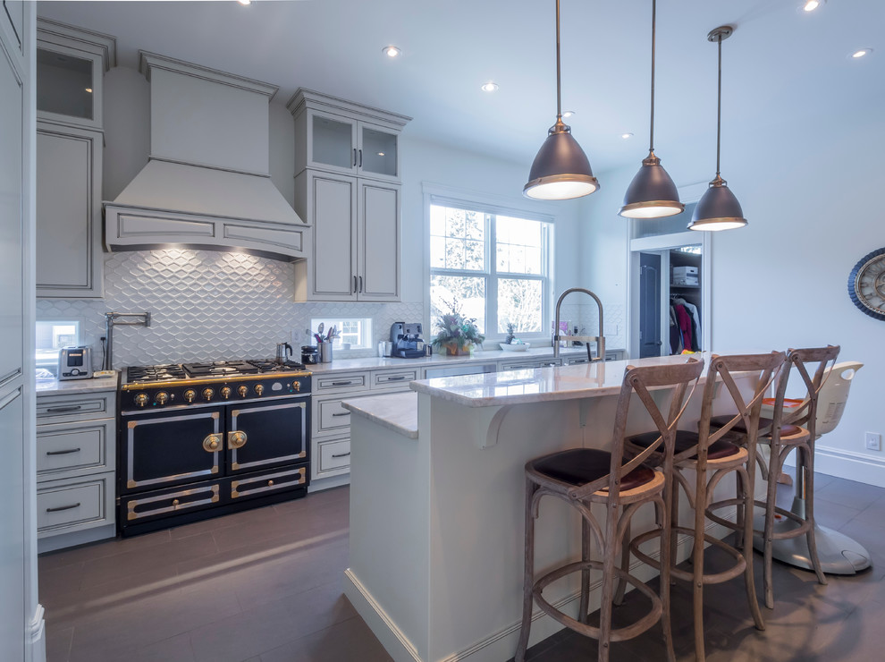 Design ideas for a mid-sized transitional l-shaped open plan kitchen in Edmonton with beaded inset cabinets, distressed cabinets, granite benchtops, white splashback, porcelain splashback, panelled appliances, with island and a double-bowl sink.