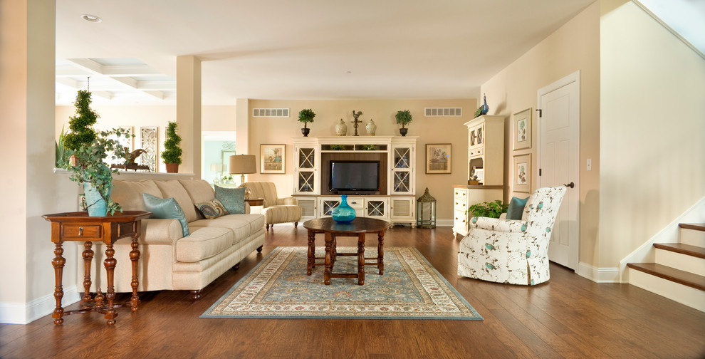 Inspiration for a large arts and crafts formal open concept living room in Other with beige walls, medium hardwood floors, no fireplace and a freestanding tv.